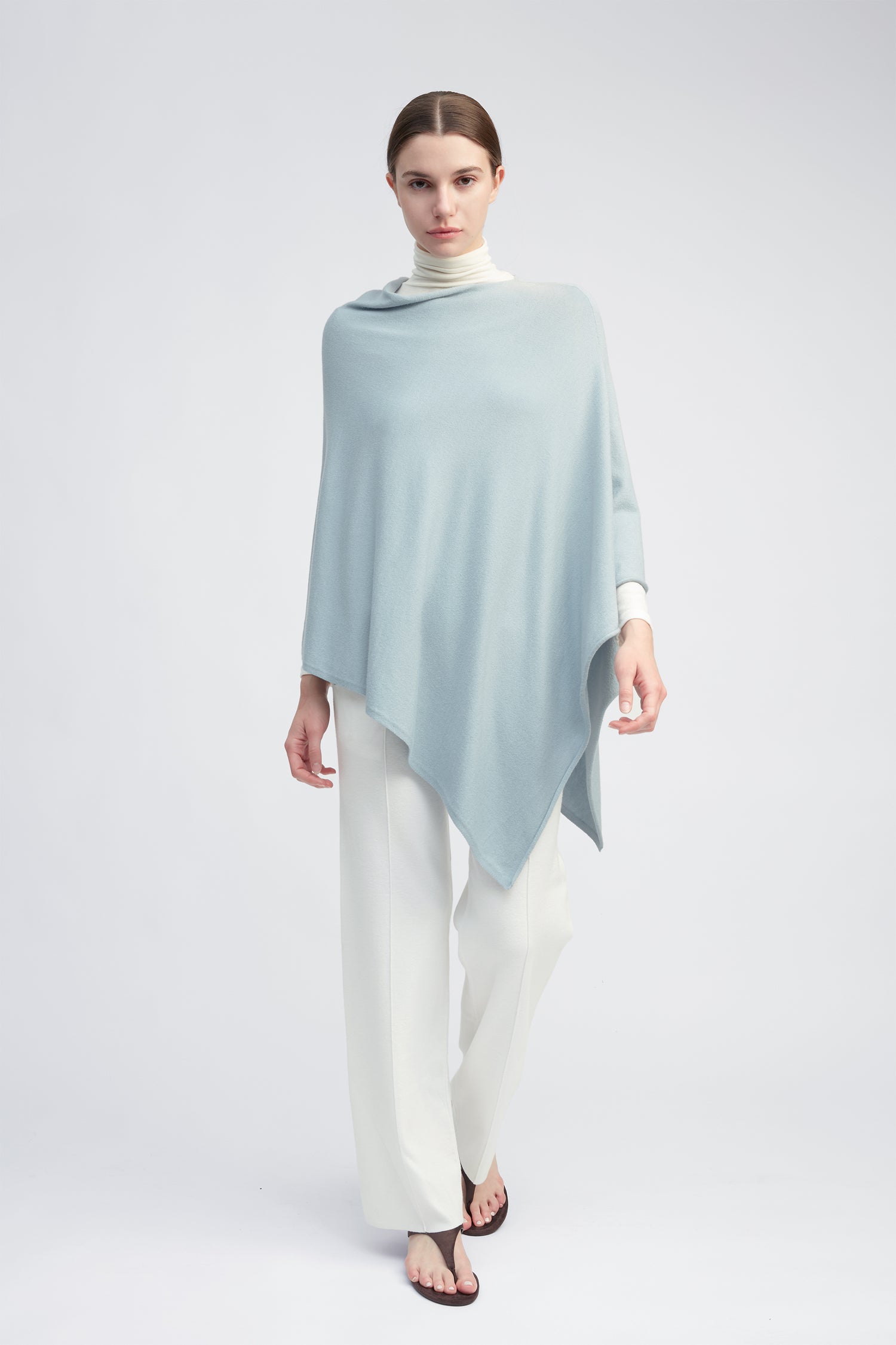 Light blue lightweight triangle poncho with fluid drape for effortless year-round layering – Common Knit