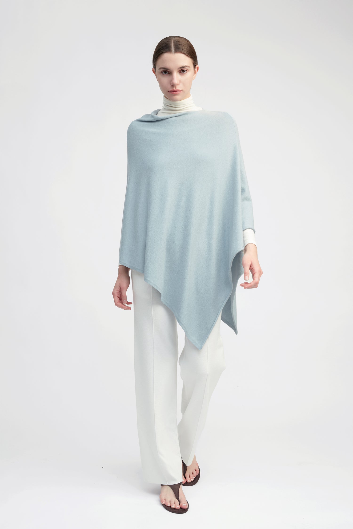 Light blue lightweight triangle poncho with fluid drape for effortless year-round layering – Common Knit