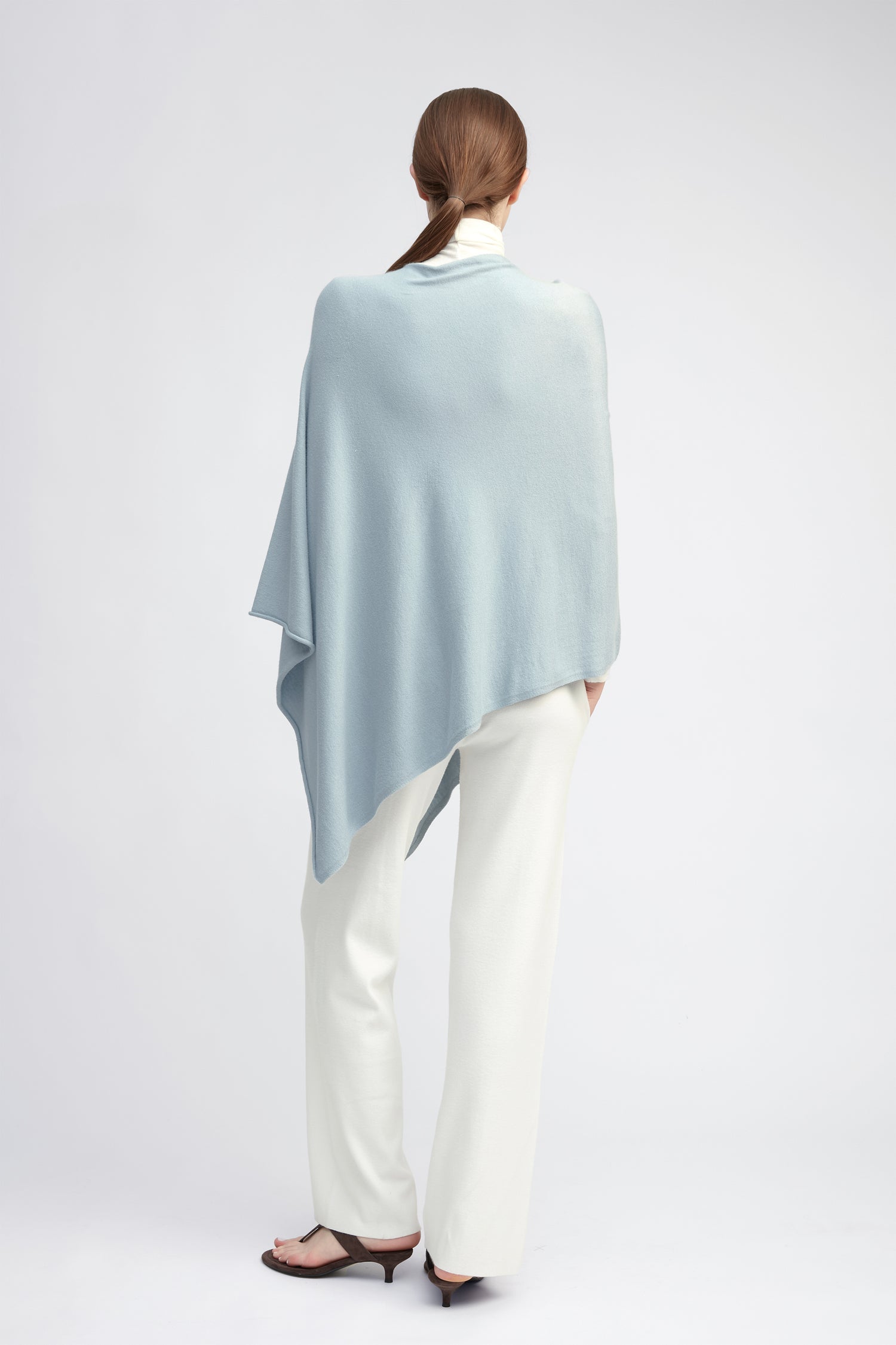 Light blue lightweight triangle poncho with fluid drape for effortless year-round layering – Common Knit