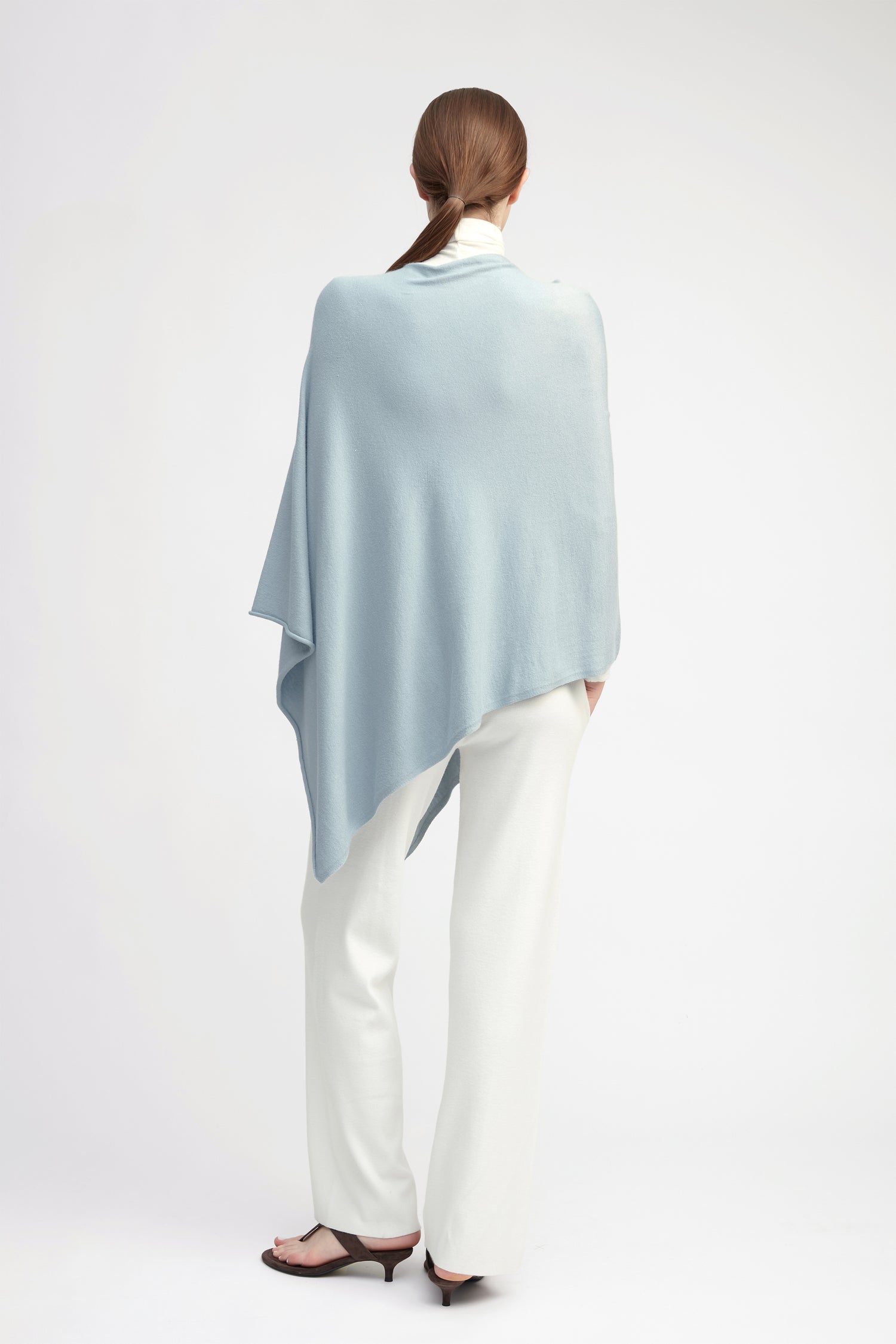 Light blue lightweight triangle poncho with fluid drape for effortless year-round layering – Common Knit