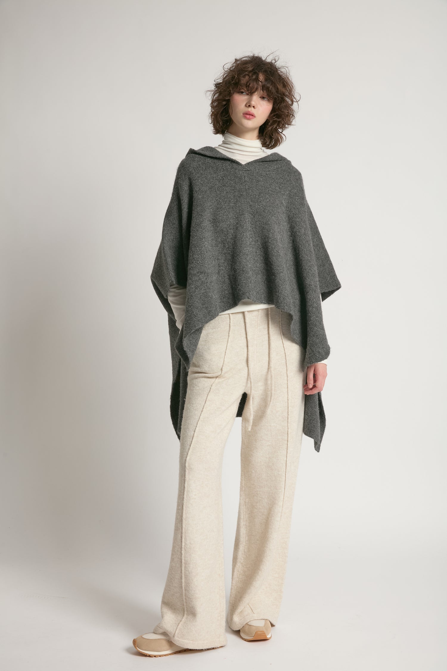Charcoal hooded pullover poncho with asymmetrical hem and relaxed fit – Common Knit