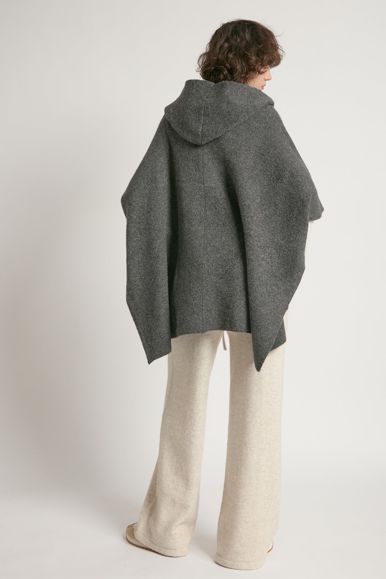 Charcoal hooded pullover poncho with asymmetrical hem and relaxed fit – Common Knit