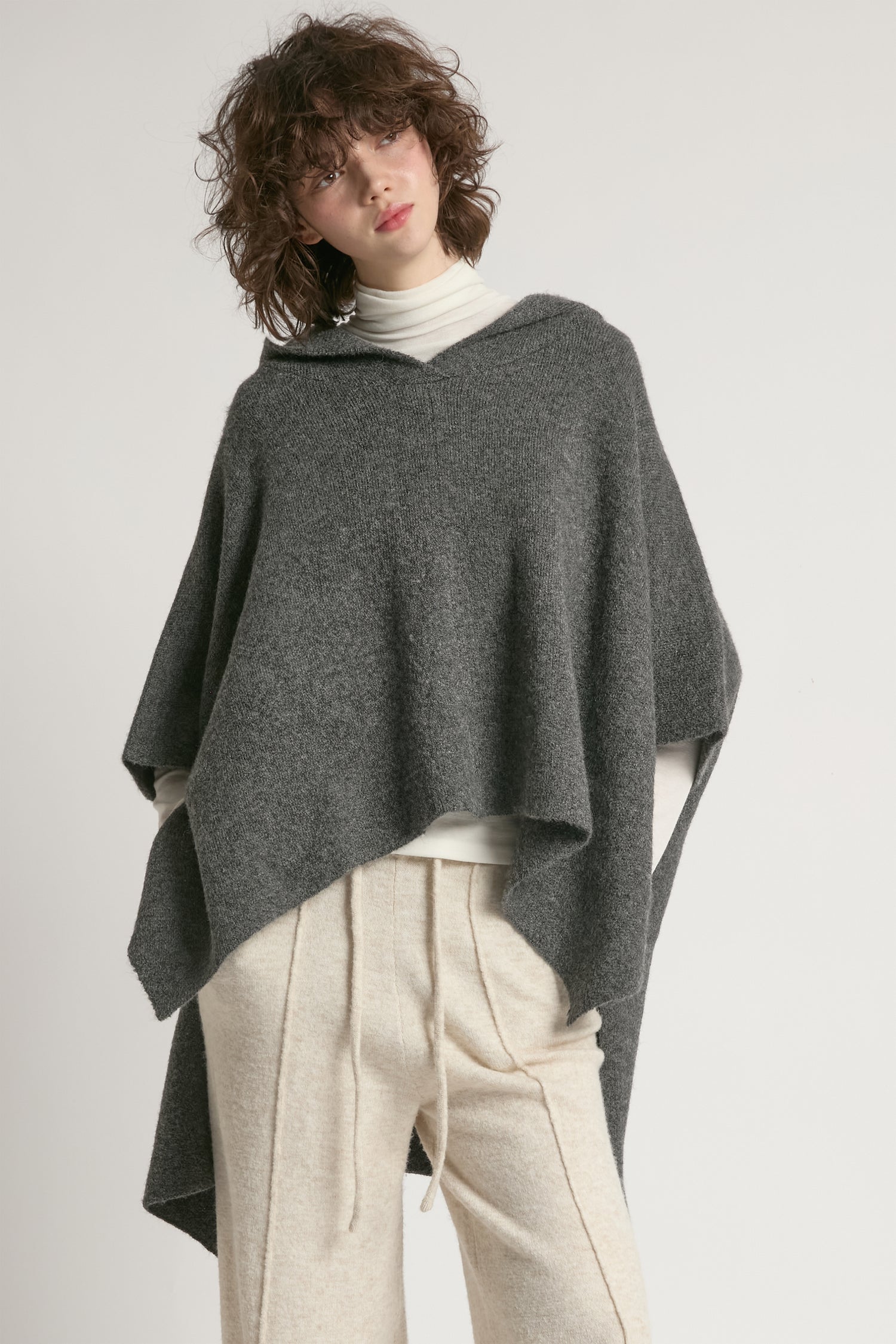 Charcoal hooded pullover poncho with asymmetrical hem and relaxed fit – Common Knit