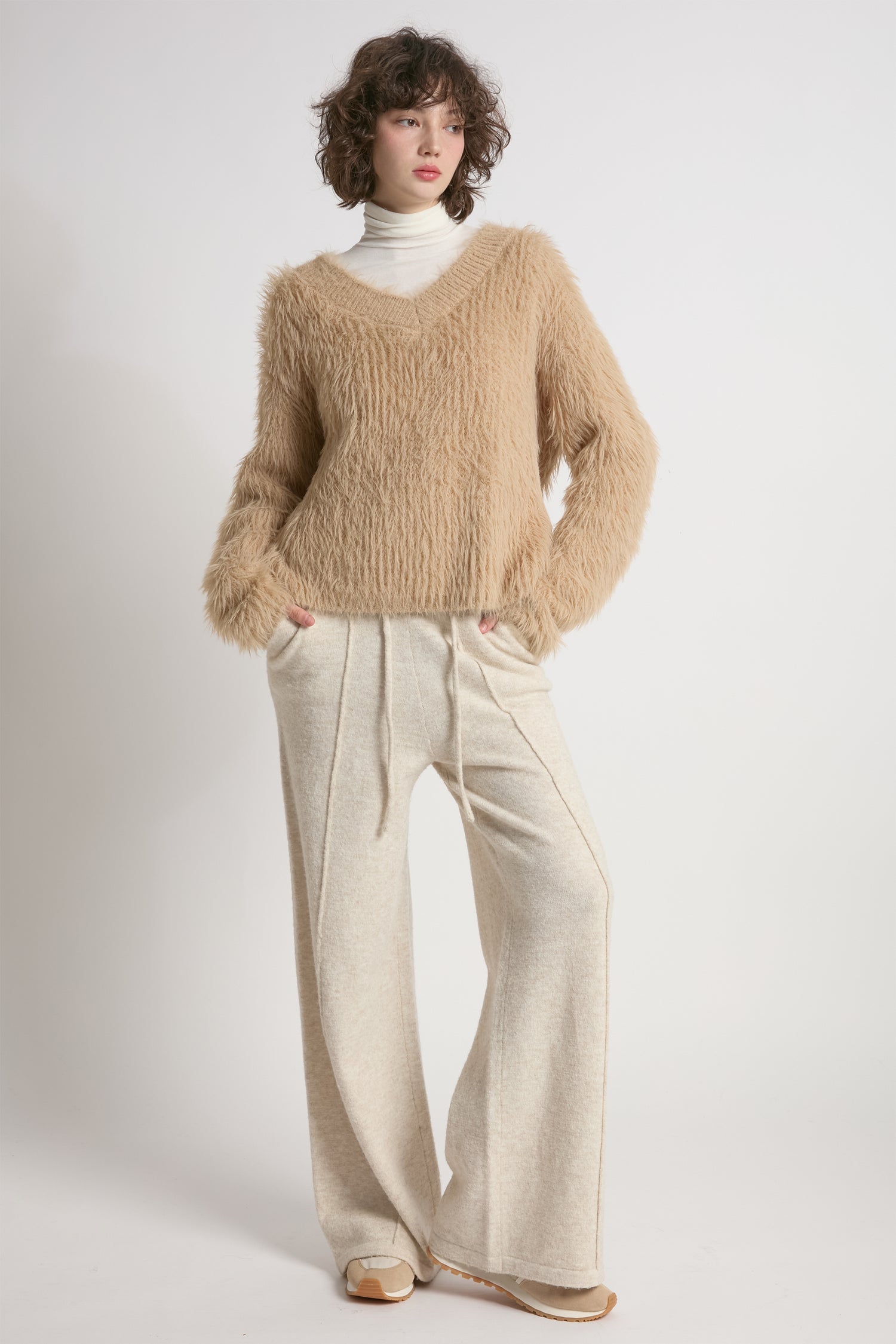 Tan oversized fuzzy eyelash sweater with soft V-neck silhouette – Common Knit