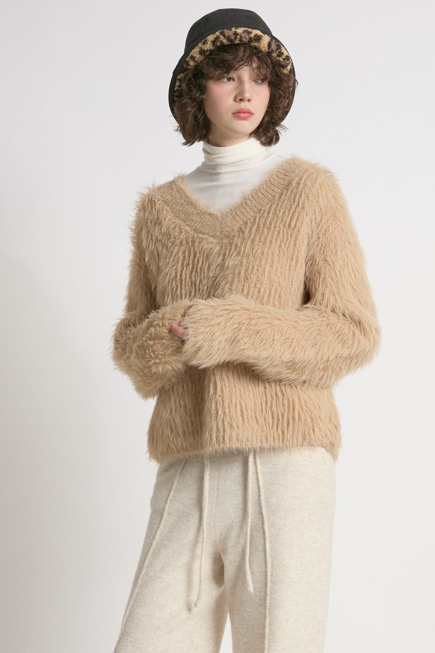 Tan oversized fuzzy eyelash sweater with soft V-neck silhouette – Common Knit