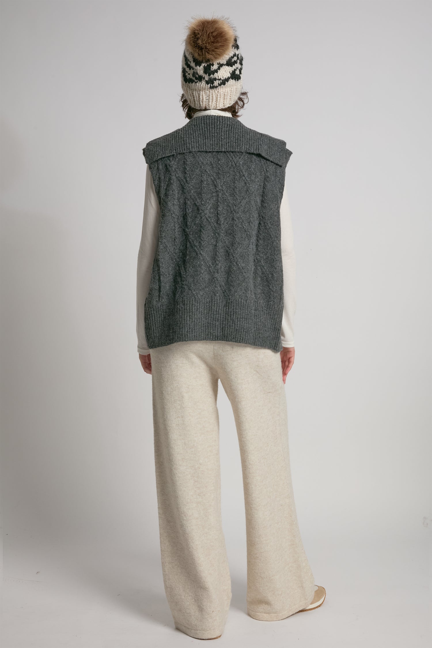 Charcoal cable knit open vest with relaxed fit for textured layering – Common Knit