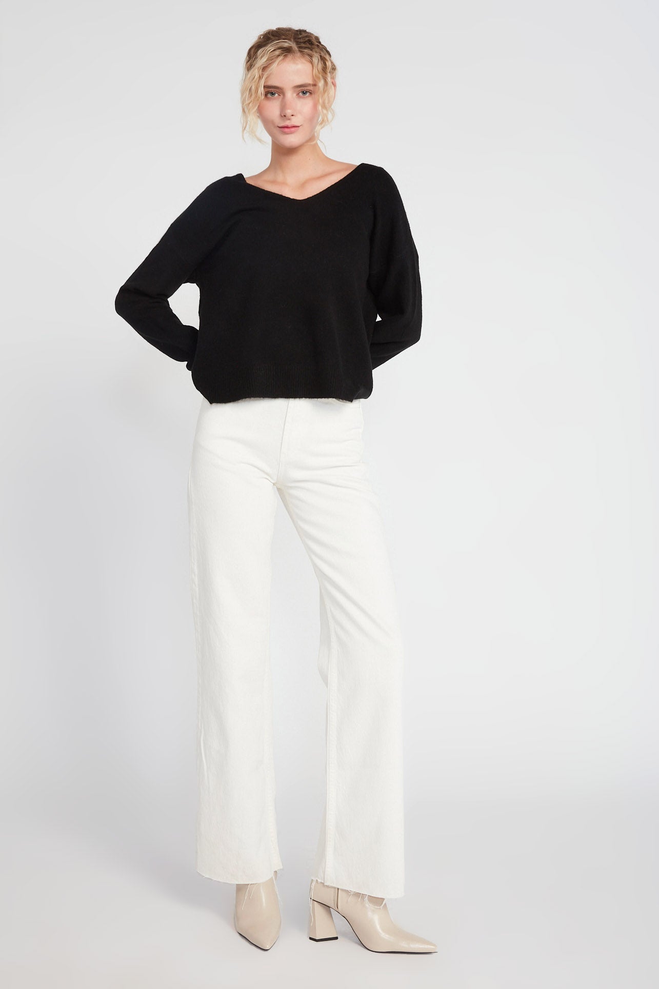 Black classic V-neck wool sweater with clean minimal silhouette – Common Knit