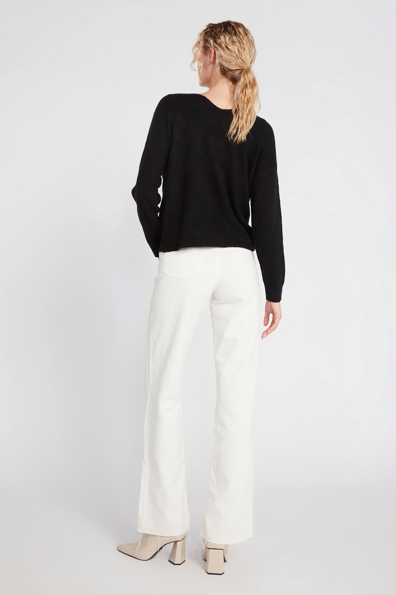 Black classic V-neck wool sweater with clean minimal silhouette – Common Knit